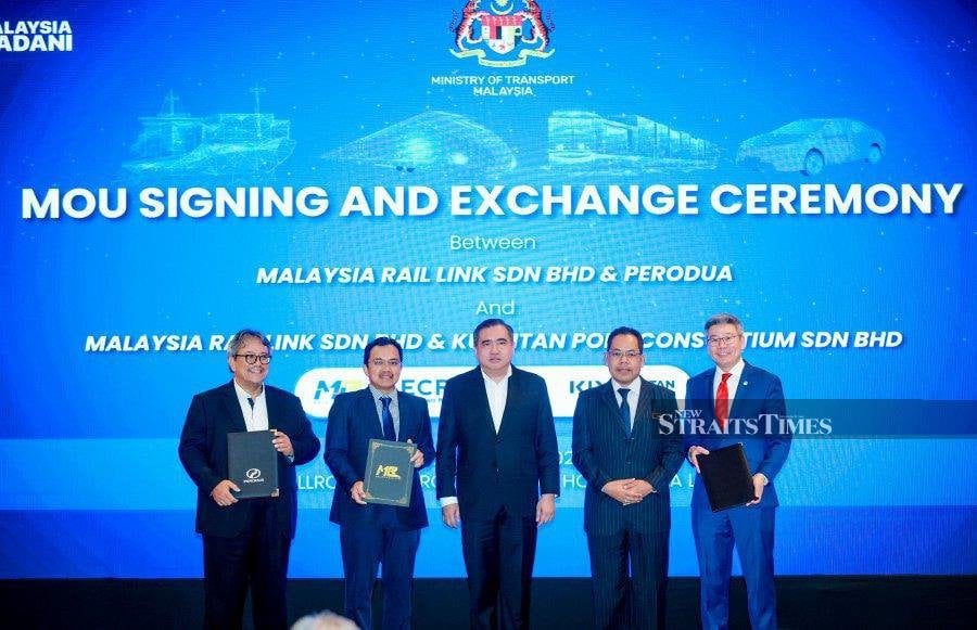 Malaysia Rail Link Sdn Bhd (MRL) has signed two memoranda of understanding (MoU) with Perusahaan Otomobil Kedua Sdn Bhd (Perodua) and Kuantan Port Consortium Sdn Bhd (Kuantan Port) to explore East Coast Rail Link's (ECRL) potential to facilitate logistic service. - NSTP/ASYRAFF HAMZAH