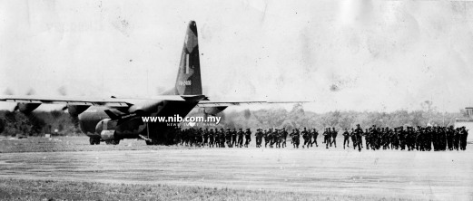 18 June 1979: A Hercules C-130 thundering down the runway of the RMAF airbase at Kuantan. It disgorges 150 invaders in light combat gear as part of the airshow held at the airbase.