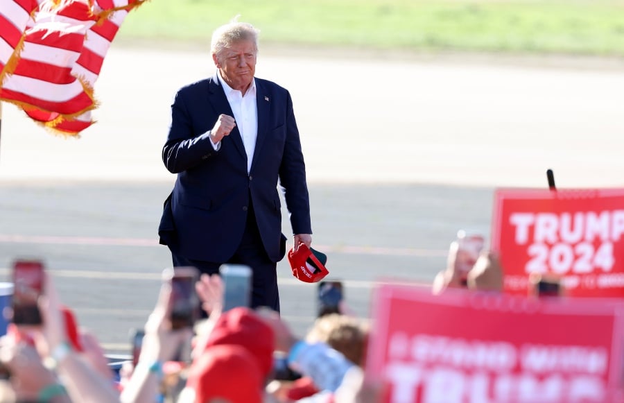 Former US President Donald Trump gestures to the crowd during his Make America Great Again Rally at the Waco Regional Airport Center in Waco, Texas, USA.- EPA Pic
