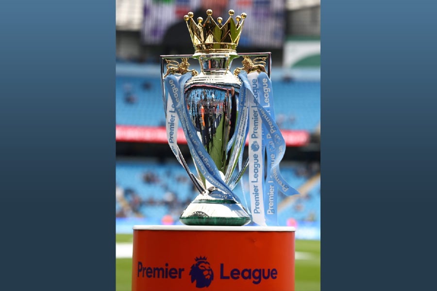 The Premier League Trophy is displayed prior to the English Premier League football match between Manchester City and Arsenal at the Etihad Stadium in Manchester, north west England. - AFP pic