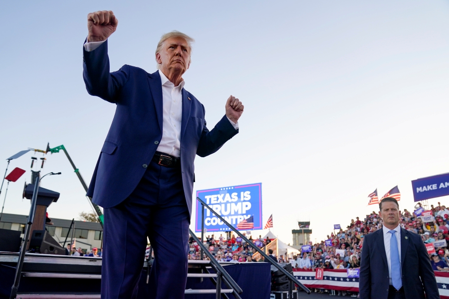 (FILE) Former President Donald Trump dances during a campaign rally after speaking at Waco Regional Airport in Waco, Texas. (AP Photo/Evan Vucci, File)