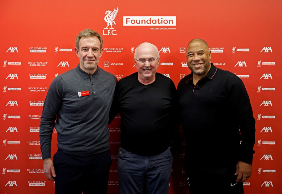 LFC foundation chief executive Matt Parish, Sven Goran Eriksson and John Barnes pose after the press conference ahead of the Liverpool Legends v Ajax Legends friendly match in Liverpool. - REUTERS PIC