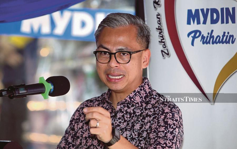 Communications Minister Fahmi Fadzil speaking to the Press after the launch of Mydin Mart Pantai Dalam earlier today. - NSTP/HAIRUL ANUAR RAHIM