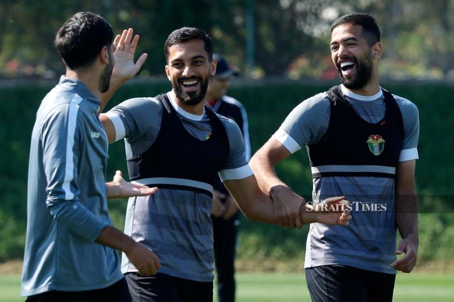 Jordan players attend a training session in Lusail, Doha on Friday on the eve of their Asian Cup final against hosts, Qatar. AFP PIC