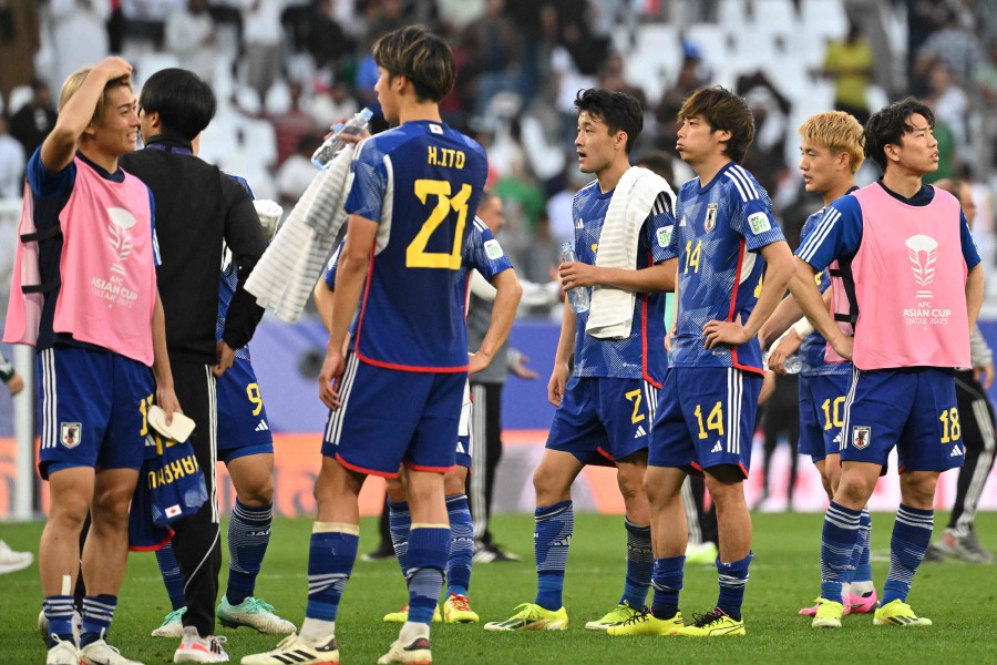 Japan's players react at the end of the Qatar 2023 AFC Asian Cup Group D football match between Iraq and Japan at the Education City Stadium in Al-Rayyan, west of Doha on January 19, 2024. AFP PIC