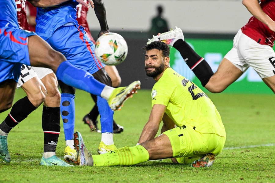 Egypt's goalkeeper 'Gabaski' Abou Gabal reacts during the Africa Cup of Nations (CAN) 2024 round of 16 football match between Egypt and DR Congo at the Stade Laurent Pokou in San Pedro. (Photo by SIA KAMBOU / AFP)