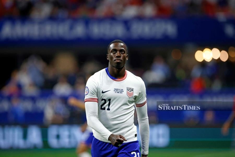 United States’ Tim Weah leaves the pitch after being shown a red card during Friday’s Copa America Group C match against Panama at Mercedes Benz Stadium in Atlanta, Georgia. AFP PIC 