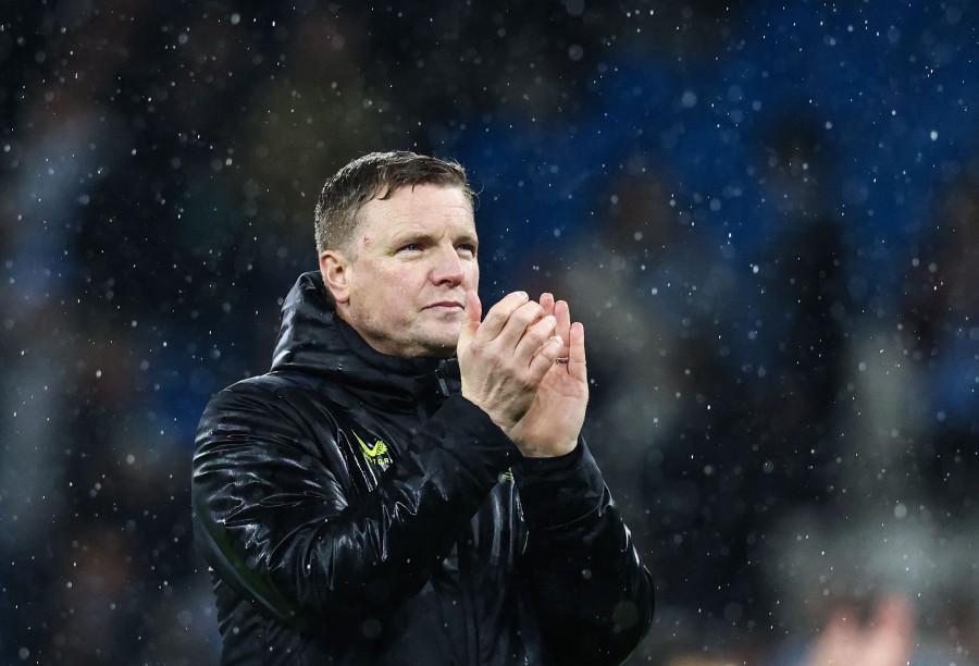 Newcastle United's English head coach Eddie Howe applauds at the end of the English FA Cup Quarter Final football match between Manchester City and Newcastle United at the Etihad Stadium in Manchester, north west England, on March 16, 2024. Manchester City wins 2 - 0 against Newcastle United. AFP PIC