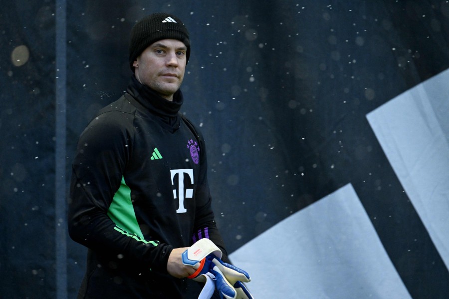 Bayern Munich's German goalkeeper #01 Manuel Neuer attends a training session during snowfall on November 28, 2023 in Munich, southern Germany, on the eve of the UEFA Champions League first round Group A match between FC Bayern Munich and FC Copenhagen. AFP PIC