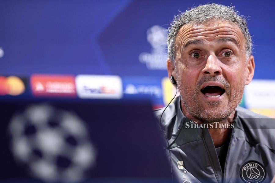 Paris Saint-Germain coach Luis Enrique gives a press conference in Poissy, west of Paris, on Tuesday on the eve of their Champions League quarter-final first leg match against Barcelona. AFP PIC 
