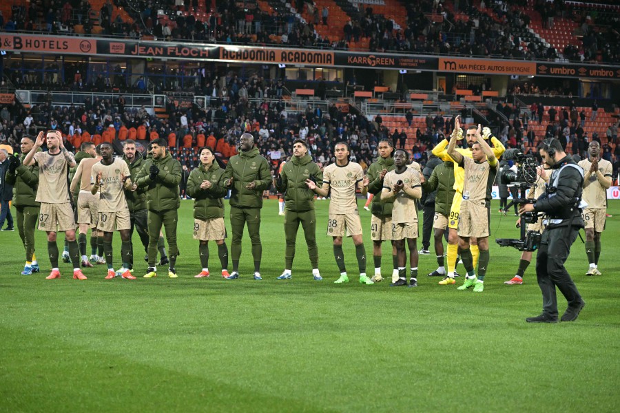 Paris Saint-Germain's players applaud the crowd at the end of the French L1 football match between FC Lorient and Paris Saint-Germain (PSG) at the Stade du Moustoir in Lorient, western France, on April 24, 2024. AFP PIC