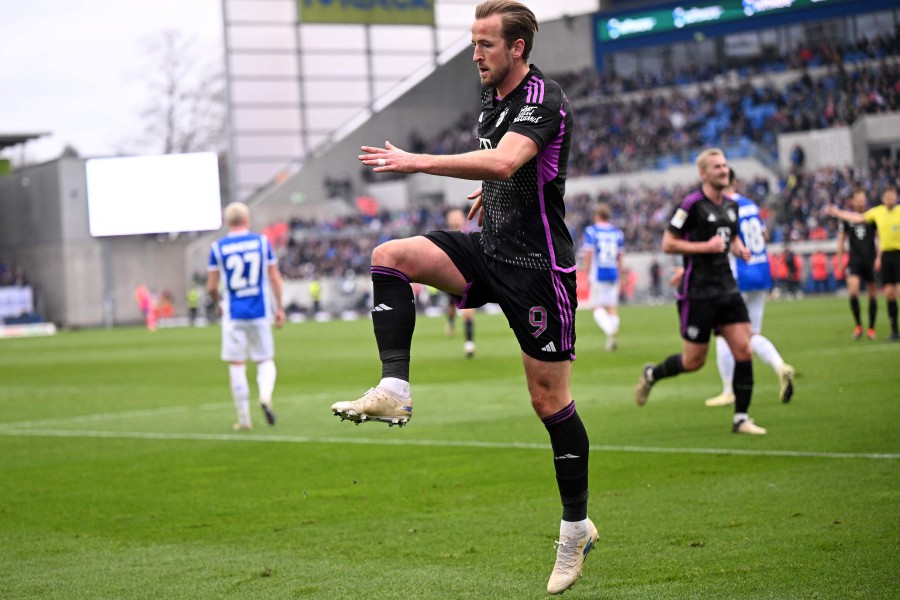 Bayern Munich's English forward #09 Harry Kane celebrates scoring during the German first division Bundesliga football match between SV Darmstadt 98 and FC Bayern Munich in Darmstadt, western Germany on March 16, 2024. AFP PIC