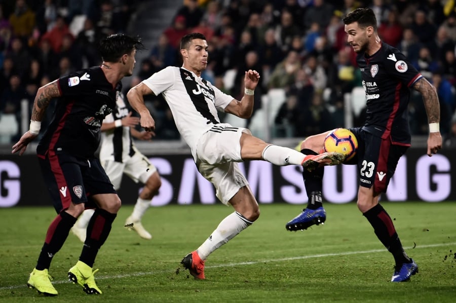 Football news - Cristiano Ronaldo on target as Juventus maintain