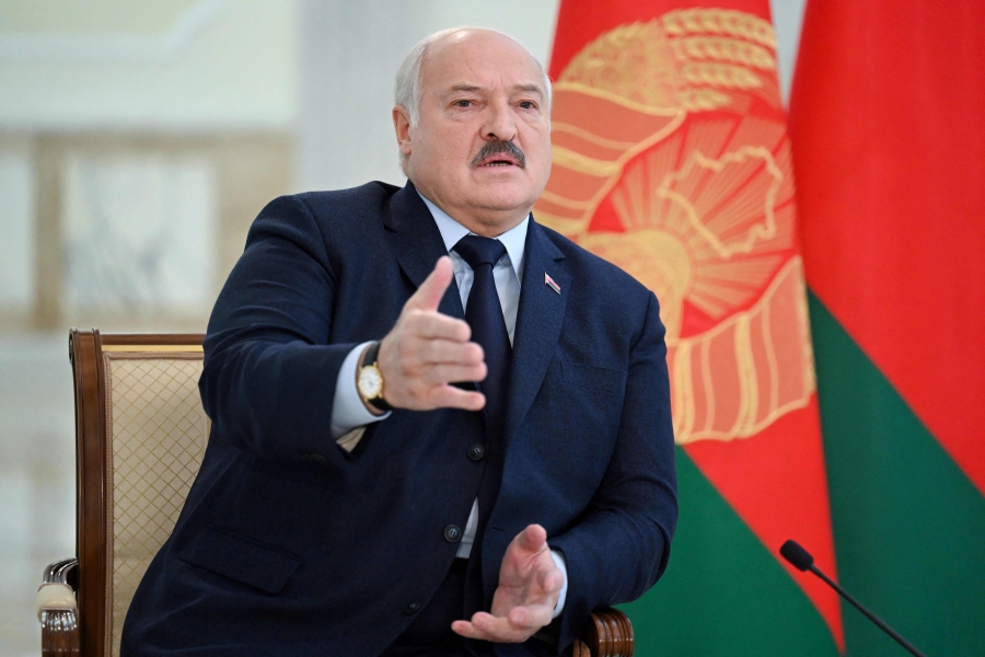 (FILES) Belarus' President Alexander Lukashenko speaks as he meets with foreign media at his residence, the Independence Palace, in the capital Minsk. (Photo by Natalia KOLESNIKOVA / AFP)