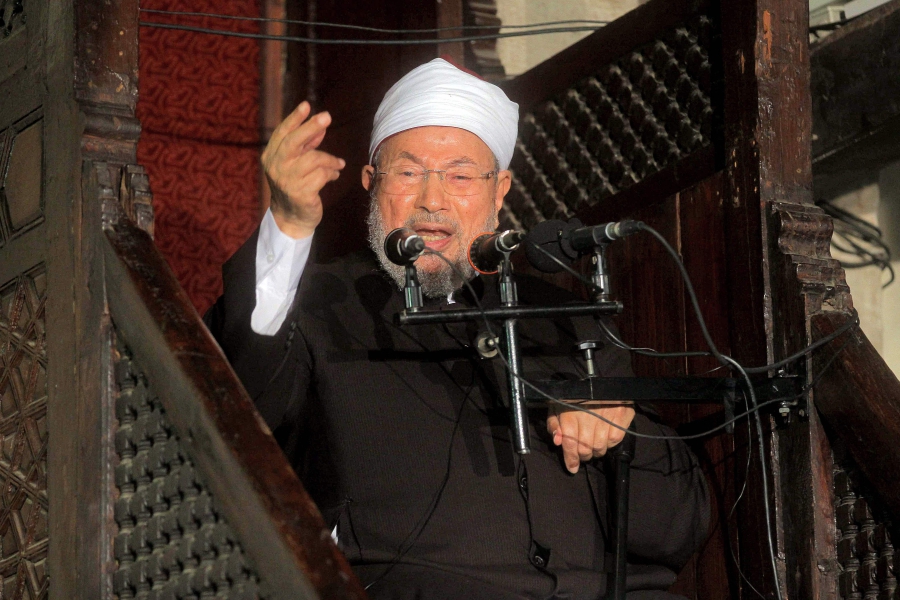 (FILES) In this file photo Egyptian Muslim scholar Sheikh Yusuf al-Qaradawi addresses Muslims at Al-Azhar mosque during the weekly Friday prayer in Cairo. (Photo by AFP)