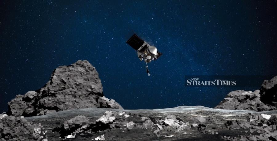 The big day has arrived for the American probe Osiris-Rex: after four years of travel, it will hit the asteroid Bennu to pick up a few tens of grams of dust, a high-precision operation 320 million kilometers away from Earth. (Photo by Handout / NASA/Goddard/Arizona State University / AFP) 