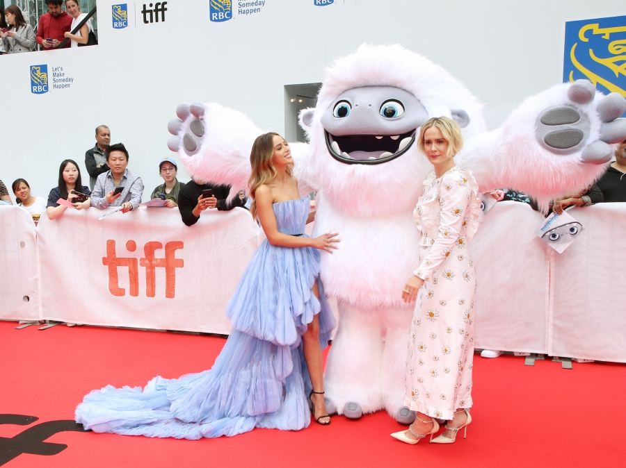 (FILES) In this file photo taken on September 7, 2019 Chloe Bennet and Sarah Paulson attend the "Abominable" premiere during the 2019 Toronto International Film Festival at Roy Thomson Hall in Toronto, Canada. - "Abominable" froze out "Downton Abbey" to take the top spot in the North American box office on its first weekend in theaters, industry watcher Exhibitor Relations estimated on September 29, 2019. The story of a teenager and her friends working to help a young Yeti -- whom they nickname Everest -- reunite with his family and avoid the clutches of a wealthy man intent on capturing one of the magical creatures took in 20.9 million. (Photo by Phillip Faraone / GETTY IMAGES NORTH AMERICA / AFP)