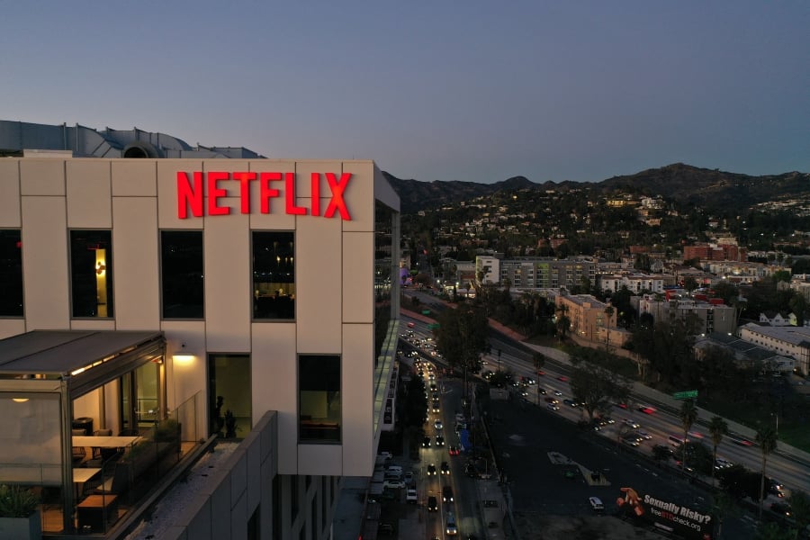 (FILES) Netflix topped expectations as it reported 9.3 million new subscribers and profits of 2.3 billion in the first three months of the year. (Photo by Robyn Beck / AFP)