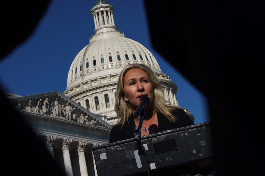 (FILES) In this file photo taken on February 05, 2021 Rep. Marjorie Taylor Greene (R-GA) speaks during a press conference outside the US Capitol in Washington, DC. - Twitter said on January 2, 2022, it has permanently suspended the personal account of outspoken Republican congresswoman Marjorie Taylor Greene for violating the platform's Covid misinformation policy. (Photo by Drew Angerer / GETTY IMAGES NORTH AMERICA / AFP)