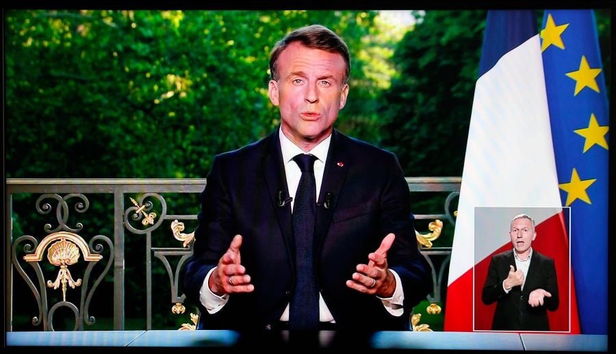 This screen shot shows France's President Emmanuel Macron speaking during a televised address to the nation during which he announced he is dissolving the National Assembly, French Parliament lower house, and calls new general elections on June 30, in Paris on June 9, 2024. - AFP pic