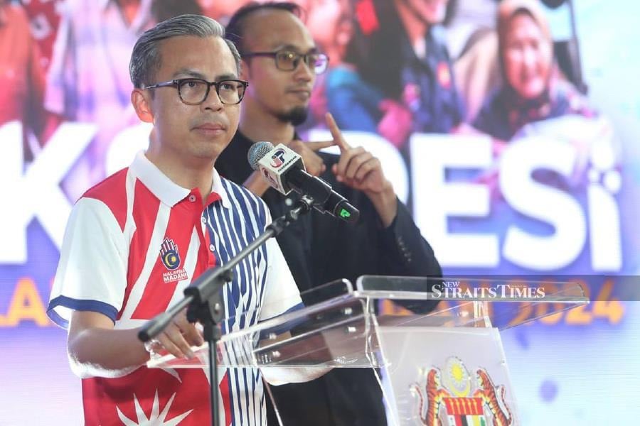 Communications Minister Fahmi Fadzil condemns the death threat and two bullets sent to Seputeh member of parliament Teresa Kok yesterday. - NSTP/MOHAMAD SHAHRIL BADRI SAALI