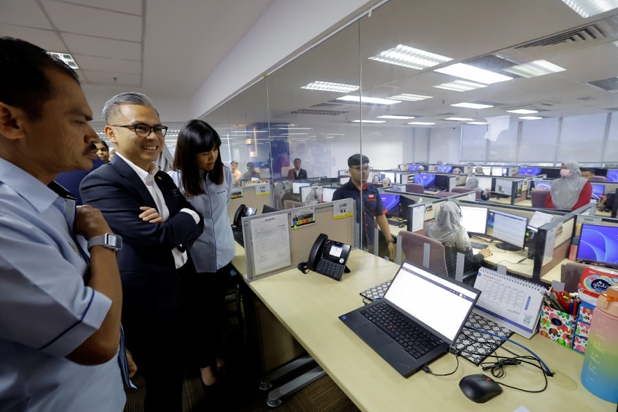 The Malaysian Government Call Centre (MyGCC), which was previously under the Malaysian Administrative Modernisation and Management Planning Unit (Mampu), is now placed under the Communications Ministry, said its Minister Fahmi Fadzil. - Bernama pic