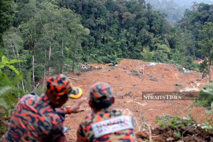 Many of the bodies recovered from the landslide in Batang Kali yesterday were found buried around 1.5-metres deep. - NSTP/HAIRUL ANUAR RAHIM