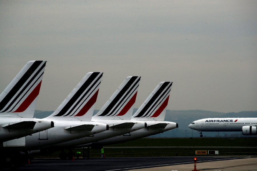 (FILE) Air France pilots are under scrutiny after recent incidents that have prompted French investigators to call for tougher safety protocols. An airline official said two Air France pilots were suspended after physically fighting in the cockpit on a Geneva-Paris flight in June, 2022. (AP Photo/Christophe Ena, File)