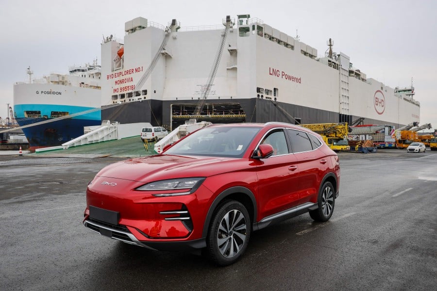 The delivery was made by the BYD Explorer No.1, the first of eight cargo ships specially commissioned by the Chinese group to expand its export operations. -- AFP photo
