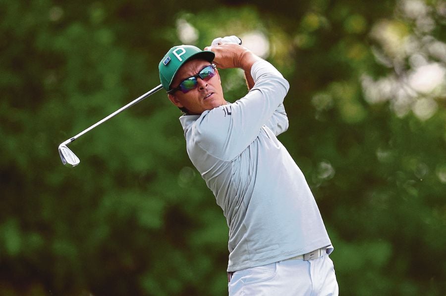 Rickie Fowler of the United States plays his shot from the fourth tee during a practice round prior to the 2024 Masters Tournament at Augusta National Golf Club in Augusta, Georgia. (Photo by Andrew Redington / GETTY IMAGES NORTH AMERICA / Getty Images via AFP)