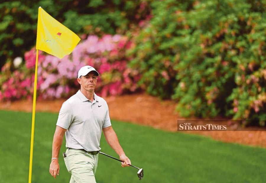 Rory McIlroy of Northern Ireland walks off the 13th hole during a practice round prior to the Masters Tournament at Augusta National Golf Club in Georgia on Tuesday. AFP PIC 