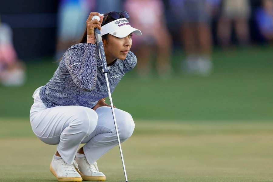 NAPLES, FLORIDA: Alison Lee of the United States lines up a putt on the 18th green during the second round of the CME Group Tour Championship at Tiburon Golf Club in Naples, Florida. - AFP pic