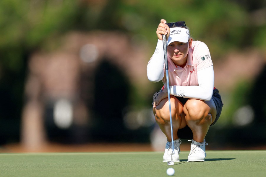 Emily Kristine Pedersen of Denmark lines up her putt on the 13th green during the third round of The ANNIKA driven by Gainbridge at Pelican at Pelican Golf Club on November 11, 2023 in Belleair, Florida. - Mike Ehrmann/Getty Images/AFP 