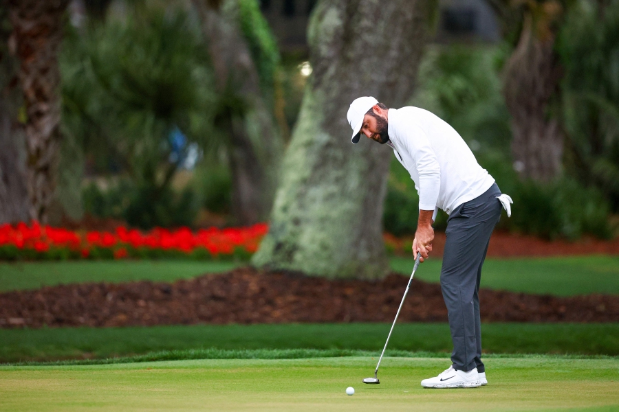 Scottie Scheffler watches a putt on the 13th hole during the final round of the RBC Heritage at Harbour Town Golf Links in Hilton Head Island, South Carolina. (Photo by Jared C. Tilton / GETTY IMAGES NORTH AMERICA / Getty Images via AFP)