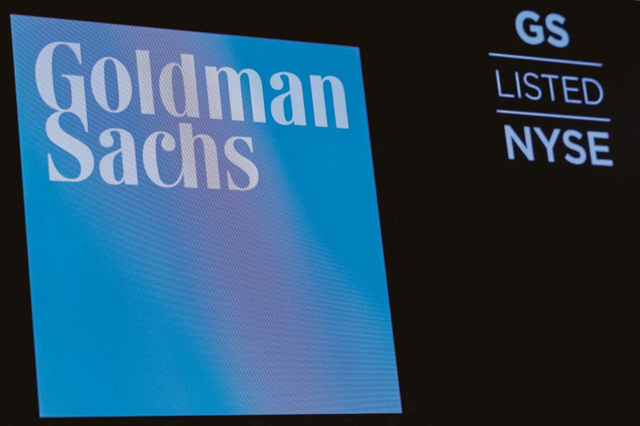 (FILE PHOTO) The ticker symbol and logo for Goldman Sachs is displayed on a screen on the floor at the New York Stock Exchange (NYSE) in New York, U.S. (REUTERS/Brendan McDermid/File Photo)