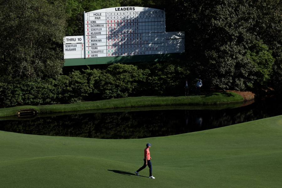 Denmark's Nicolai Hojgaard walks past the scoreboard on the 11th hole during the third round. (REUTERS/Mike Segar)