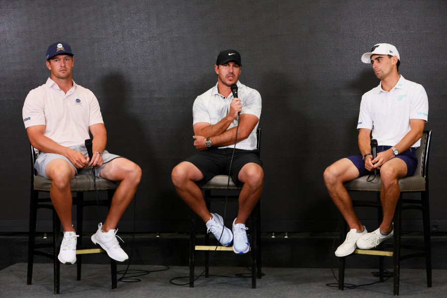 From left, Bryson DeChambeau, Brooks Koepka and Joaquin Niemann talk to reporters during press conference at a LIV Golf Miami practice round at Trump National Doral. AFP PIC