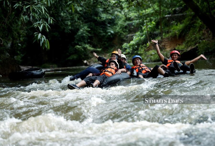 Enjoy the cold water of Sungai Ketil at Rekreasi Rimba Wangi.