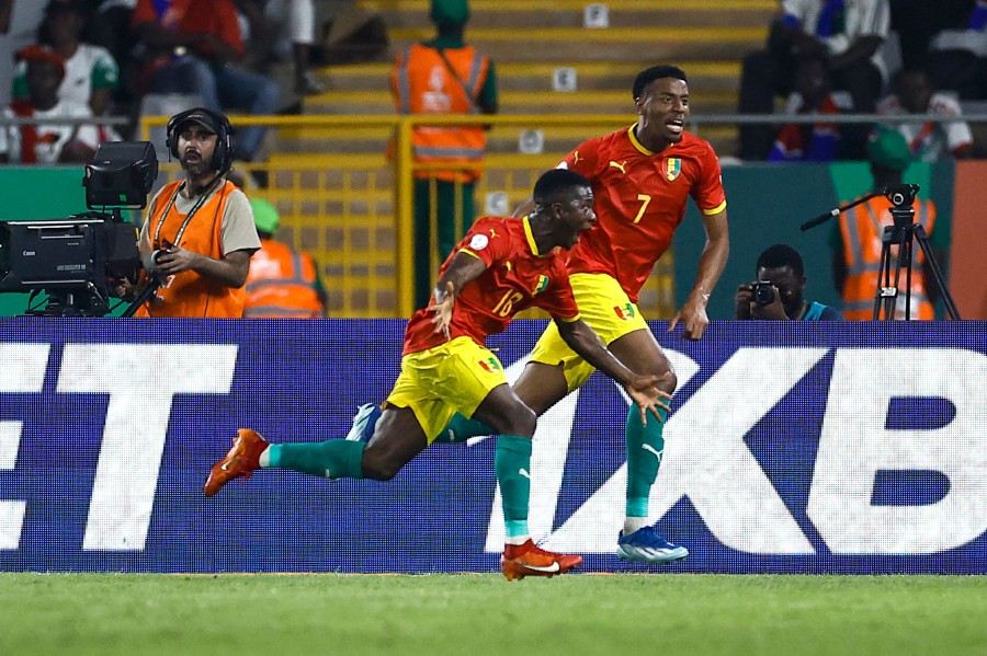 Guinea's midfielder Aguibou Camara celebrates scoring his team's first goal during the Africa Cup of Nations (CAN) 2024 group C football match between Guinea and Gambia at the Stade Charles Konan Banny in Yamoussoukro. - AFP pic