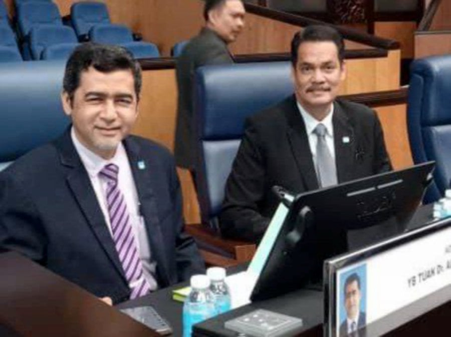 Appointed assemblyman Dr Aliakbar Gulasan (left) during the Sabah Assembly Sitting. Pic courtesy of Sabah Pas