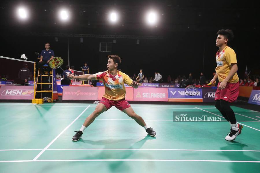 Malaysia are assured of a pair in the men's doubles final of the Badminton Asia Championships in Ningbo, China after Goh Sze Fei-Nur Izzuddin Rumsani stunned reigning Olympic champions Lee Yang-Wang Chi Lin today. - NSTP file pica
