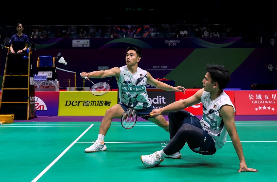 Goh Sze Fei-Nur Izzuddin Rumsani turned heroes when they delivered the third and winning point today in Chengdu, China to send Malaysia into their first Thomas Cup semi-finals in eight years. - Bernama pic