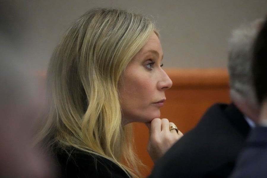 Gwyneth Paltrow sits in court during an objection by her attorney during her trial, in Park City, Utah. Paltrow is accused in a lawsuit of crashing into a skier during a 2016 family ski vacation, leaving him with brain damage and four broken ribs. (AP Photo/Rick Bowmer, Pool)