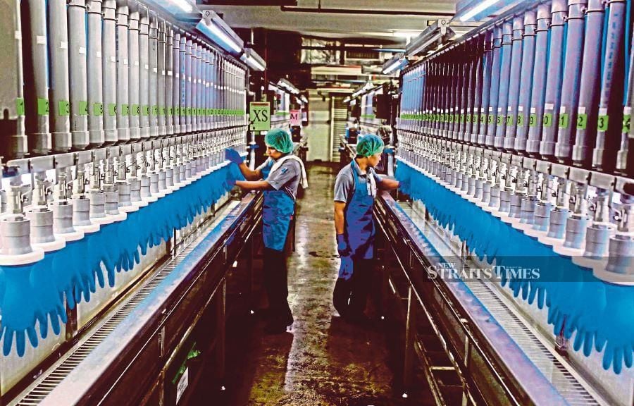 Glove manufacturing at Hartalega factory at Sepang. NSTP/YAZIT RAZALI