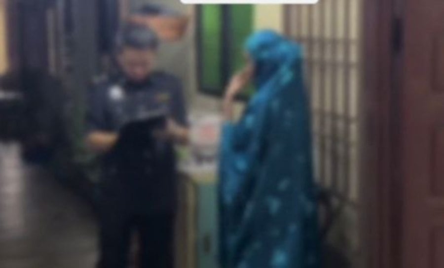 A screenshot from the viral video shows members of the victim's family being interviewed at the location of the incident. 
