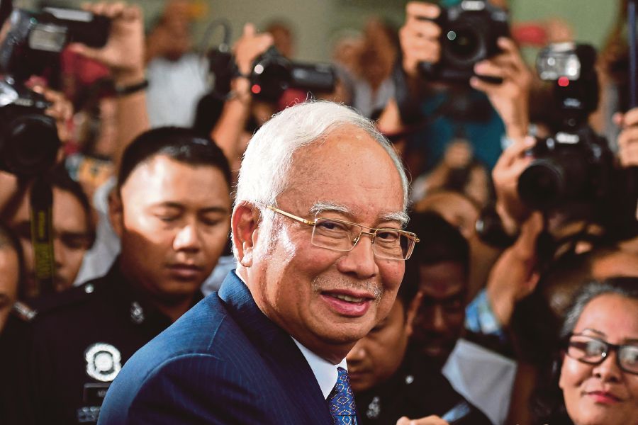 The decision of the Pardons Board to reduce Datuk Seri Najib Razak’s sentence was influenced by Najib’s contributions to the nation, said Datuk Seri Anwar Ibrahim. - AFP pic