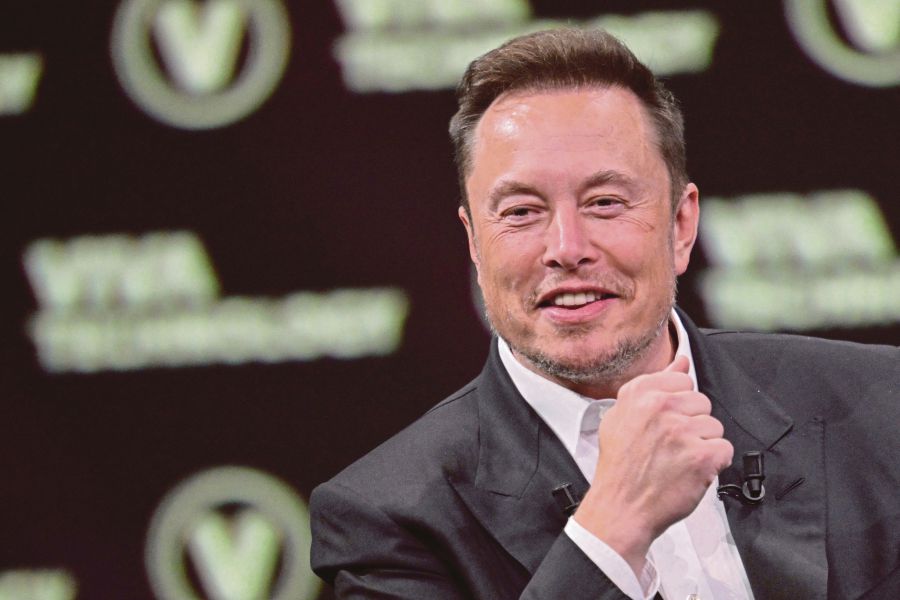 (FILES) SpaceX, Twitter and electric car maker Tesla CEO Elon Musk looks on as he speaks during his visit at the Vivatech technology startups and innovation fair at the Porte de Versailles exhibition center in Paris. - AFP Pic