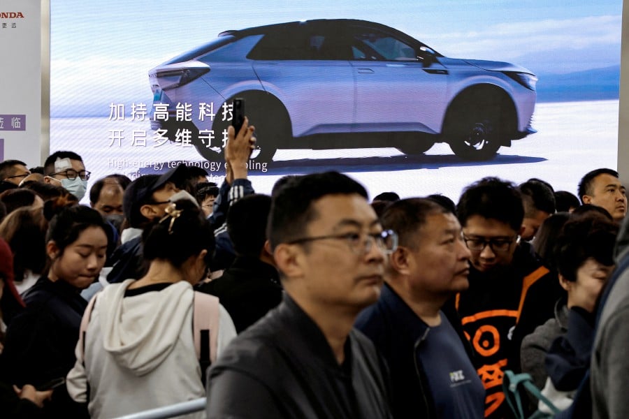 Japan’s second-largest automaker by volume announced a share buyback worth up to 300 billion yen ($1.93 billion) after beating analysts’ fourth quarter earnings estimates, helped by strong sales growth in the United States, which offset a decline in China. -- Reuters photo