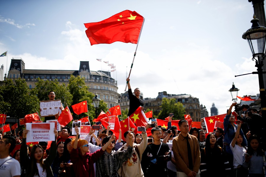 HK activists, Beijing supporters protest in London, Paris