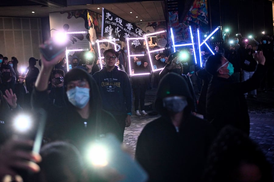 Five held over mans death in Hong Kong protests